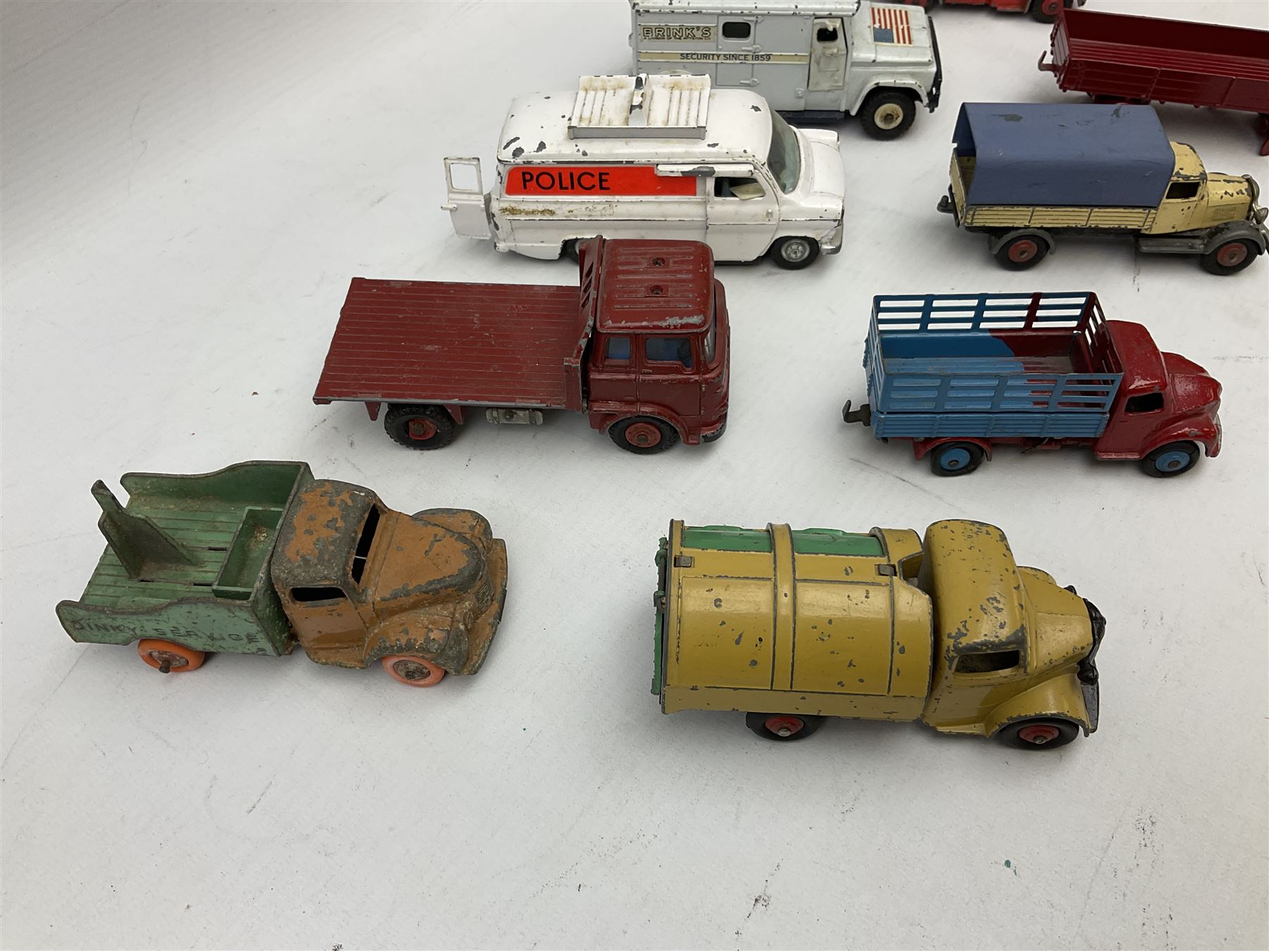Dinky - twelve unboxed and playworn/repainted die-cast commercial vehicles including Hindle Smart Helecs, two Bedford tipper trucks, Dodge tipper truck, two Commer breakdown trucks, Brinks Armoured Car, Bedford Refuse wagon etc (12)
