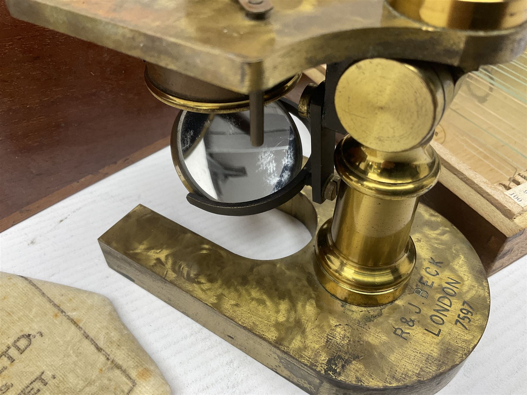 R & J Beck London microscope, model 7597, contained in fitted case, together with a boxed collection of glass microscope biological sample slides