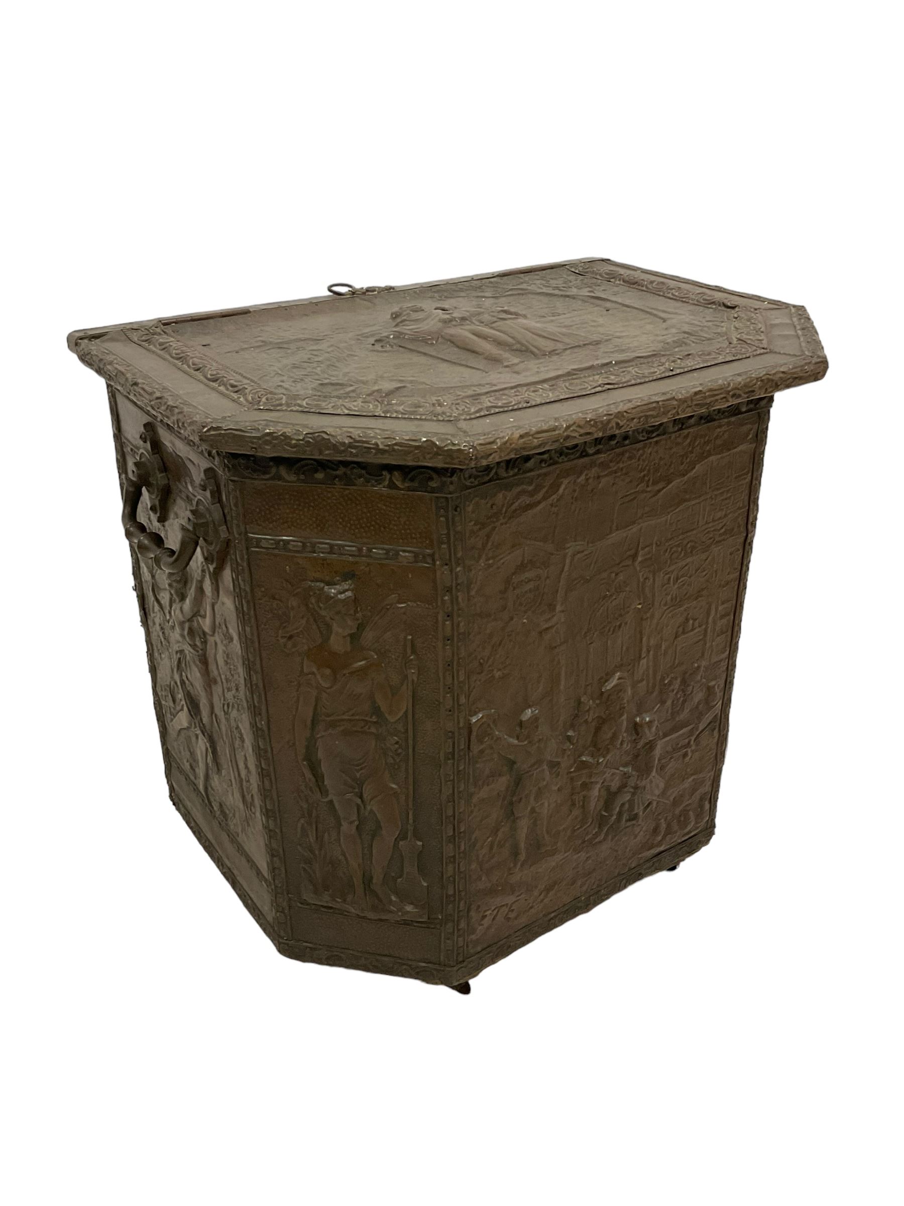 Large 19th century wooden and brass repousse coal box, rectangular form with canted front, enclosed by hinged lid decorated with figural countryside scene, the front panel depicting tavern scene at the 'Scours Contre la Soif' and initialled 'Ete', the remaining panels decorated with mythical scenes, with metal lining and hinged carrying handles, on castors
