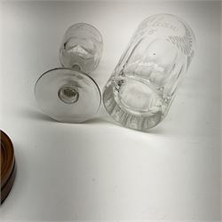 19th century drinking glasses, with sliced and engraved decoration, and a small circular turned wood frame, D9cm