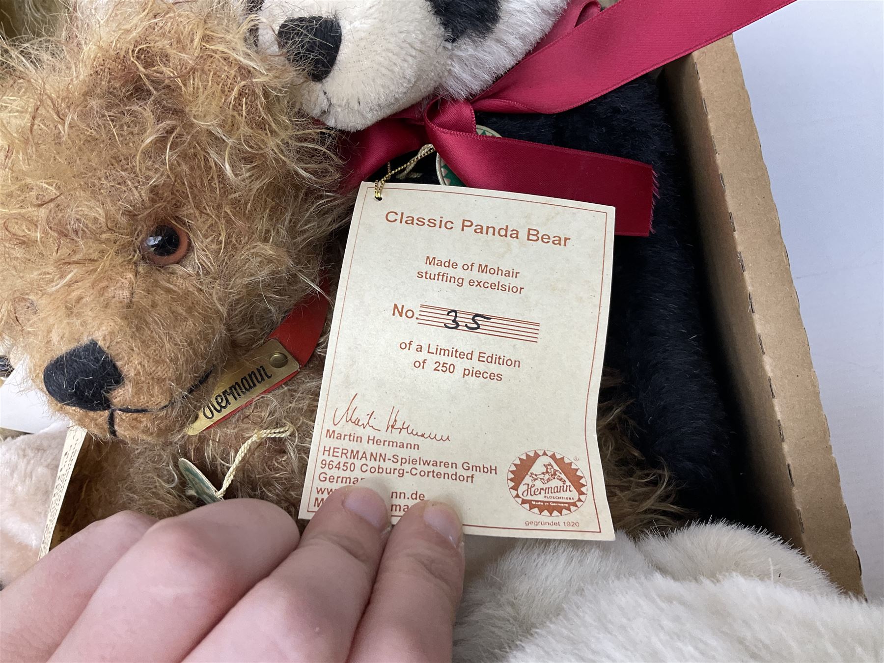 Quantity of teddy bears, predominantly Hermann examples, to include limited edition examples, Little Hilde, Classic Panda Bear, A Handful of Joy, etc, together with Merrythought bear, Martin Germany bears, bear with growler etc in two boxes