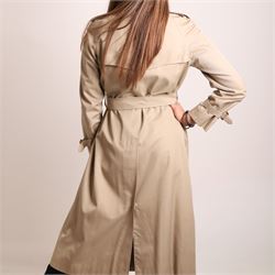 Burberrys and Aquascutum - two vintage trench coats, comprising a Burberrys red cotton trench coat with navy, red and grey check lining, labelled Burberrys, Made in England, and an Aquascutum beige cotton trench coat with house check lining, labelled Aquascutum, Made in England, both size L (2)