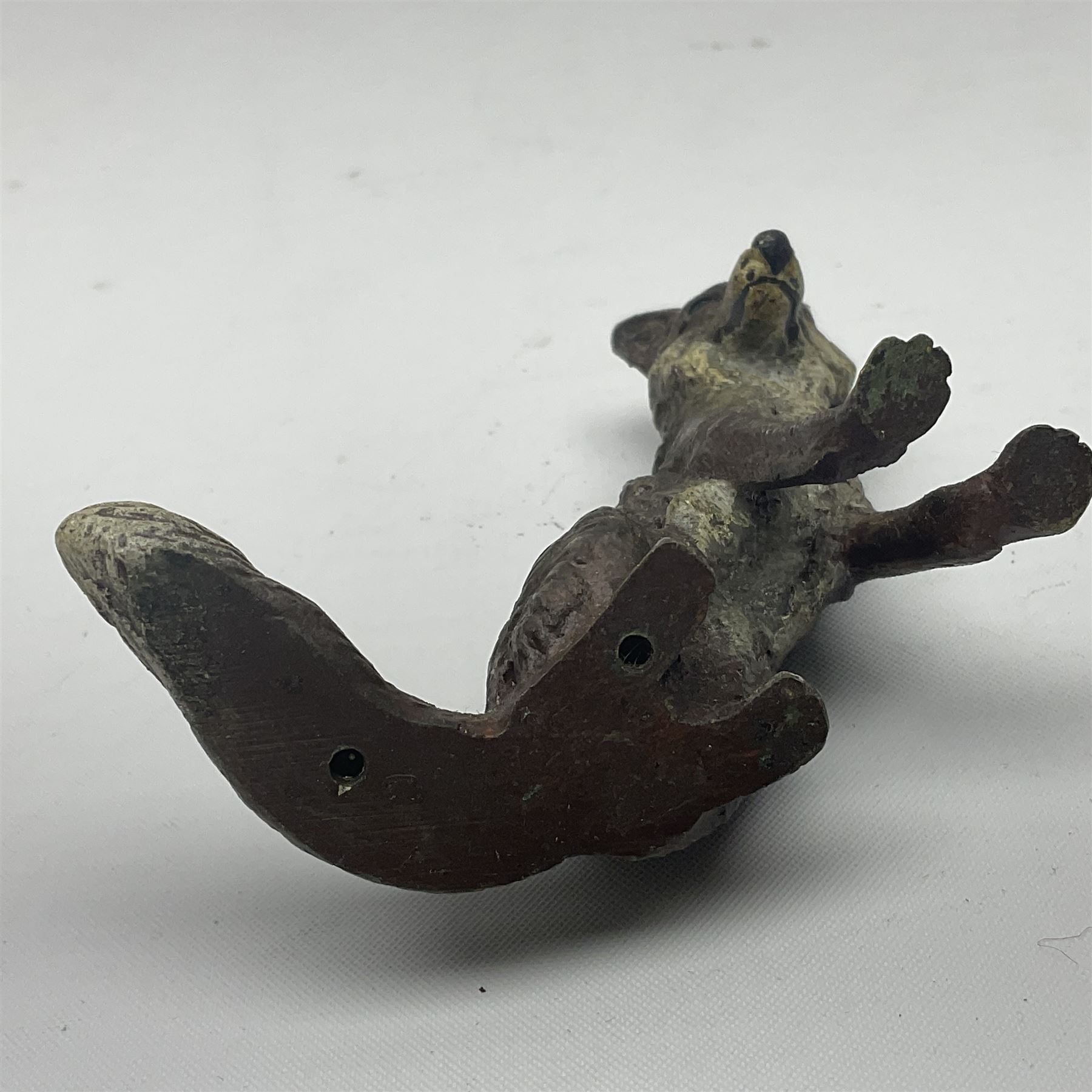 Cold painted bronze model of a seated fox, together with similar standing terrier, fox H5cm