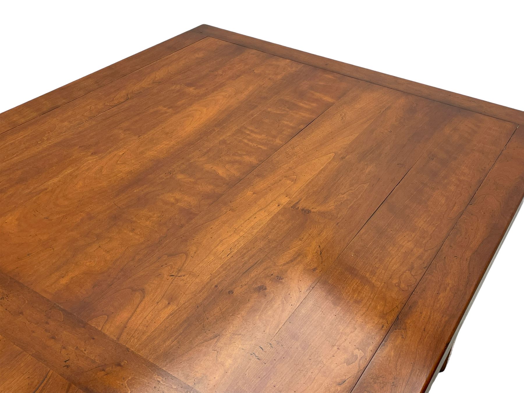 Contemporary French farmhouse design cherry wood dining table, rectangular bordered top on square chamfered supports 