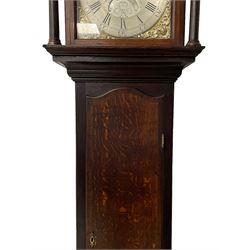 Thomas Hutchinson of Leeds - 18th century 8-day oak longcase clock with as broken arched  pediment and moulded cornice, with a conforming hood door flanked by plain turned pilasters with gesso capitals,  long trunk door with a wavy top on a square plinth with a raised panel, brass dial with cast spandrels,  engraved silvered dial centre and chapter ring with Roman numerals, five minute Arabic's and minute track, with pierced steel hands, seconds pointer,  arched calendar aperture and silvered boss engraved with the makers name to the break arch, dial pinned to a rack striking two train movement with a recoil anchor escapement. With weights and pendulum. Thomas Hutchinson is recorded as working in Leeds from 1760-90.