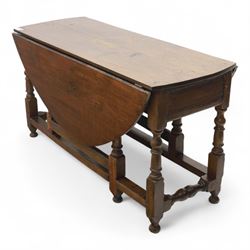 Early 19th century oak drop-leaf gateleg table, oval top above plain frieze, on ring turned legs joined by stretchers