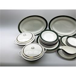 Wedgwood dinner service, twelve place mats and six coasters consisting of dinner plates, side plates, soup plates, bowls, six espresso cups and saucers for six,Two serving platters, two vegetable serving dishes, two serving dishes with lids, one gravy boat and saucer 
