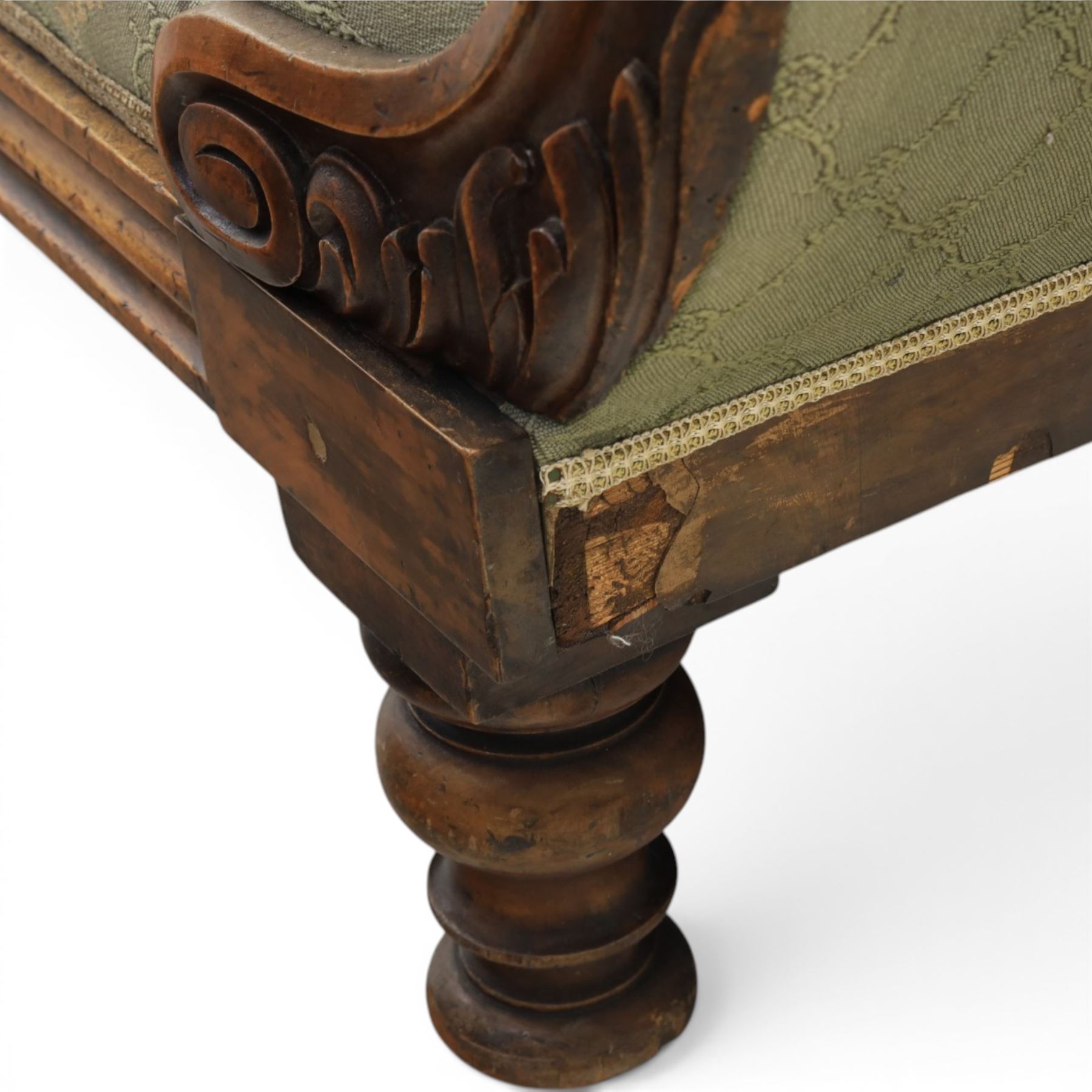 Victorian mahogany framed sofa, scroll arms with double camel back, green geometric upholstery, raised on turned supports