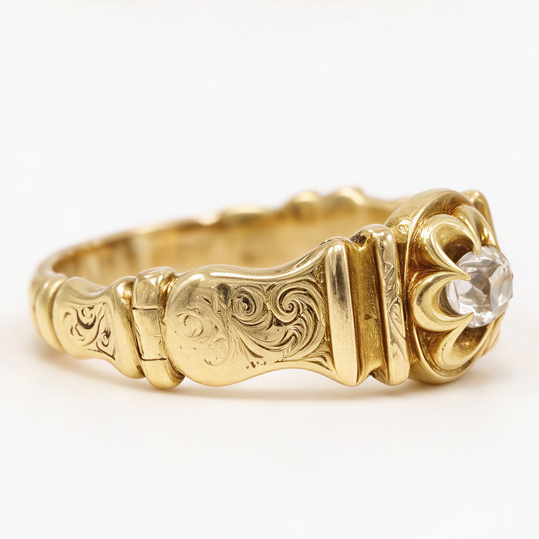 Victorian 18ct gold diamond ring, single cushion shaped old cut diamond of approx 0.45 carat, in an eight claw buttercup setting, to a foliate engraved shank
