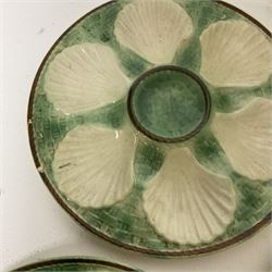 Set of six Chantilly France majolica style oyster plates and further larger serving dish, largest D32cm