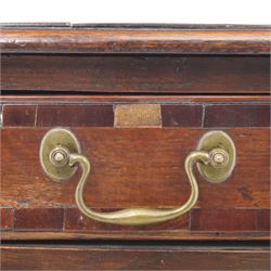 18th century oak and mahogany banded lowboy, rectangular moulded top with crossbanded edge, fitted with one long and two short drawers with brass swan neck handles, shaped kneehole apron, raised on cabriole supports with pad feet