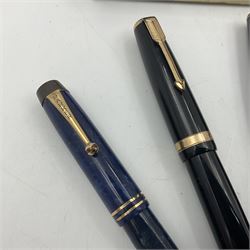 Four Parker Duofold fountain pens, together with Parker Duofold junior, all with 14ct gold nibs  