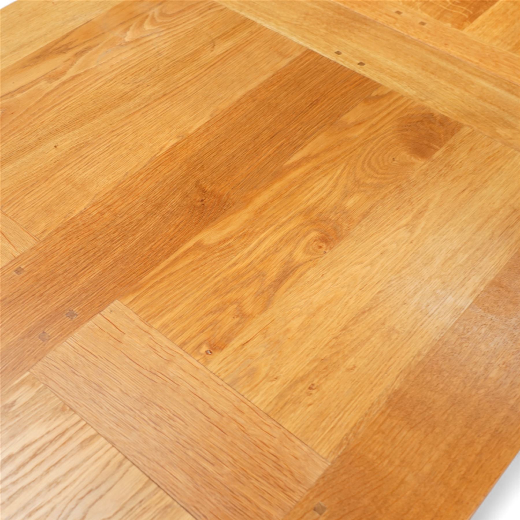 Light oak extending dining table, rectangular top with two additional leaves, on square chamfered supports united by H-stretchers