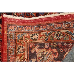  Persian Kashan red ground rug, floral and urn repeating border, central medallion, 295cm x 390cm  