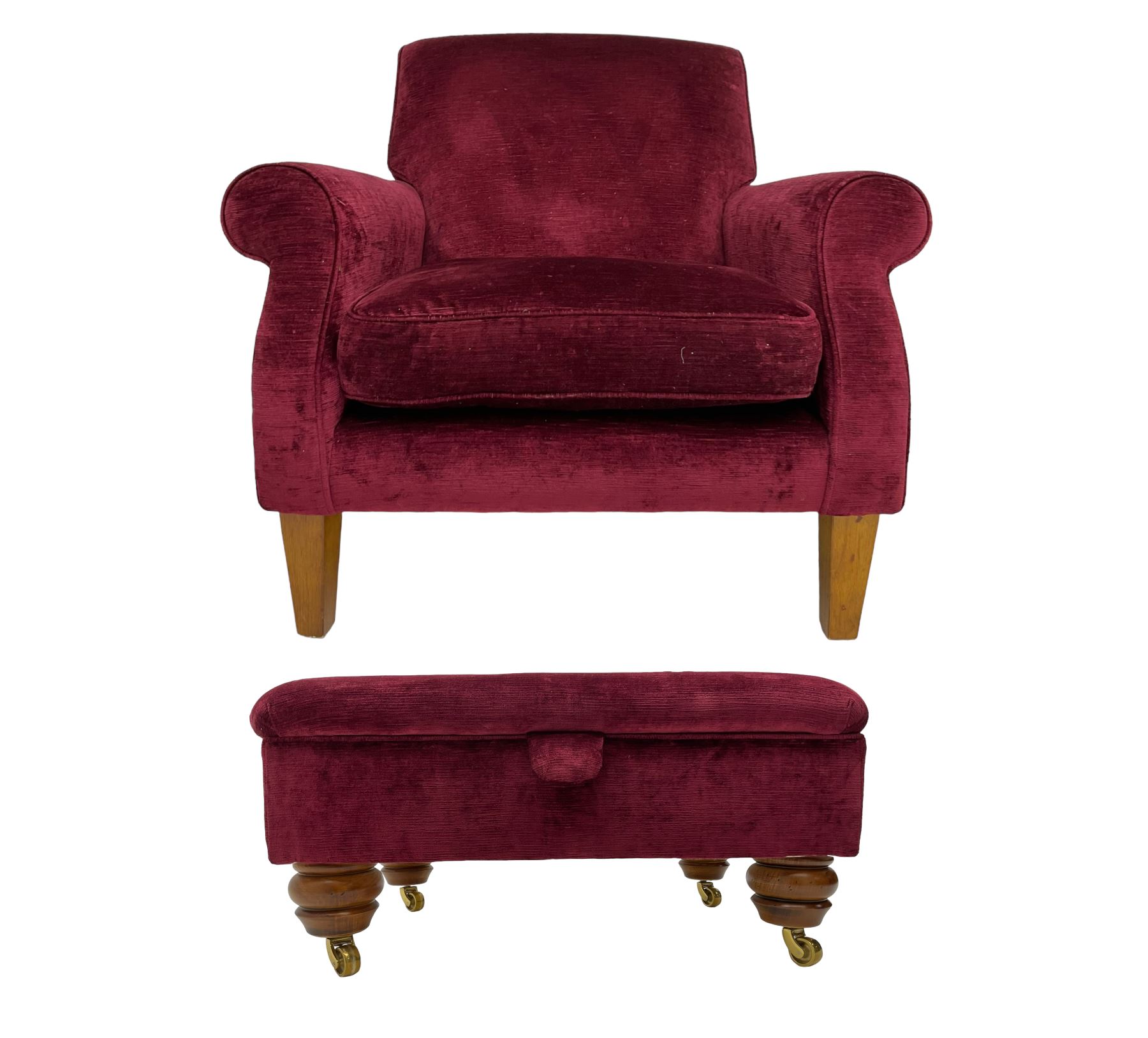 Duresta - traditional shape armchair upholstered in burgundy red velvet, on square tapering front supports (W88cm, H85cm, D103cm); together with a matching rectangular footstool with hinged seat, on turned feet with brass castors (73cm x 54cm, H38cm)