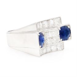 Platinum sapphire and diamond abstract design dress ring, pave set with eighteen old cut and round brilliant cut diamonds, with two mixed cut sapphires at each end, in a curved design setting, total sapphire weight approx 2.68 carat, total diamond weight approx 1.95 carat, with World Institute Report