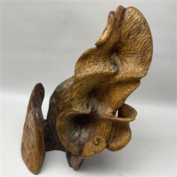 Helen Skelton (British 1933 – 2023): Three carved wooden abstract sculpture, all with an adzed finish, largest H38cm. Born into an RAF family in 1933 in Kent and travelled the world extensively during her childhood. After settling in Bridlington, Helen immersed herself in painting, textiles, and wood sculpture, often inspired by nature's beauty. Her talent was showcased in a one-woman show at Sewerby Hall and recognised with the sculpture prize at Ferens Art Gallery in 2000. Sadly, Helen’s daughter passed away from cancer in 2005. This loss inspired Helen to donate her sculptures to Marie Curie upon her passing in 2023.