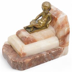 Brass and marble bookends with reclining putti figures, together with a brass figure of a cherub, bookends H8cm 