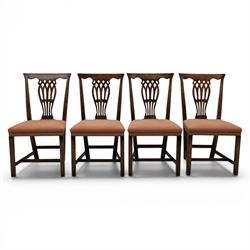 Set of eight George III dining chairs with padded seats, pierced vasiform splat, upholstered seat with brass trim, on square supports with H-stretcher
