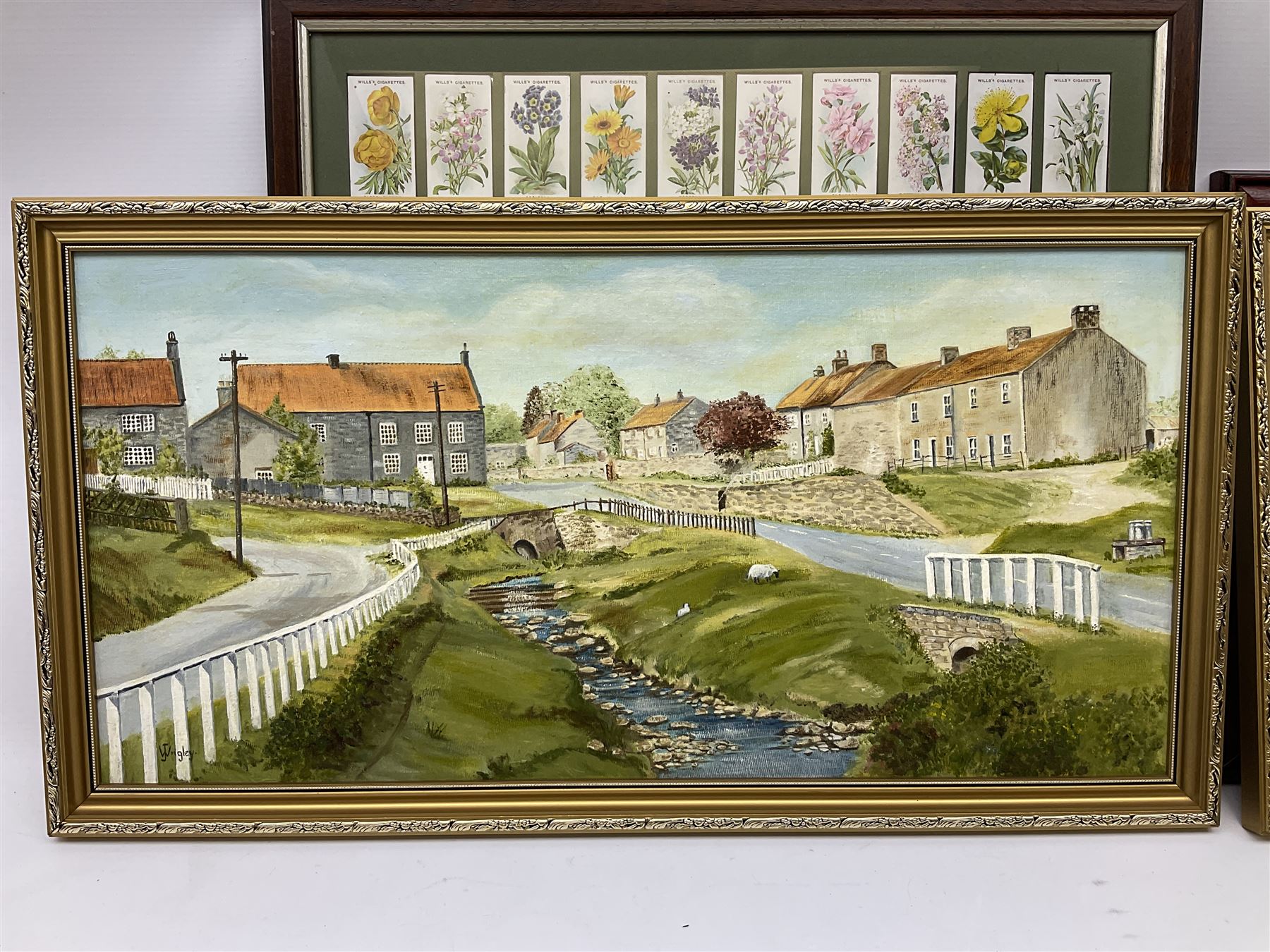 Will's Cigarette cards - Wild Flowers Second Series (framed) together with J Wrigley (British 20th century): 'Great Ayton', pair oils on board signed and two other prints max 38cm x 44cm (5)