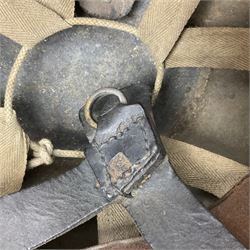 WW2 British Airborne Troops/Paratroopers Steel Helmet with green textured paint finish and netting cover, leather and sponge liner and three point chinstrap mounting; liner marked BMB 1943; together with a paratrooper's maroon beret with metal badge (2)