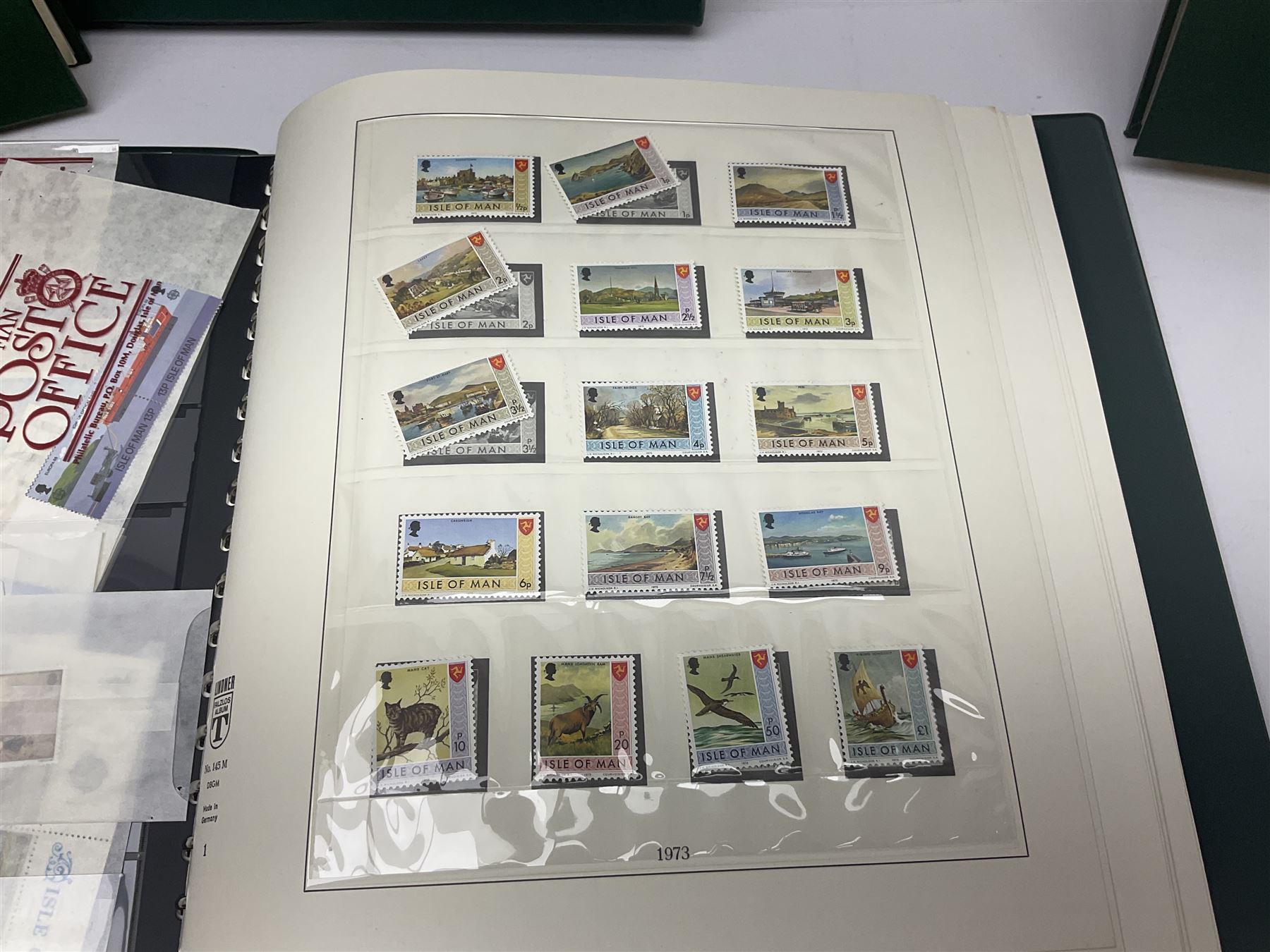 Mostly Queen Elizabeth II Great Britain and Isle of Man stamps including mint examples, housed in various albums, stockbooks and loose, in one box