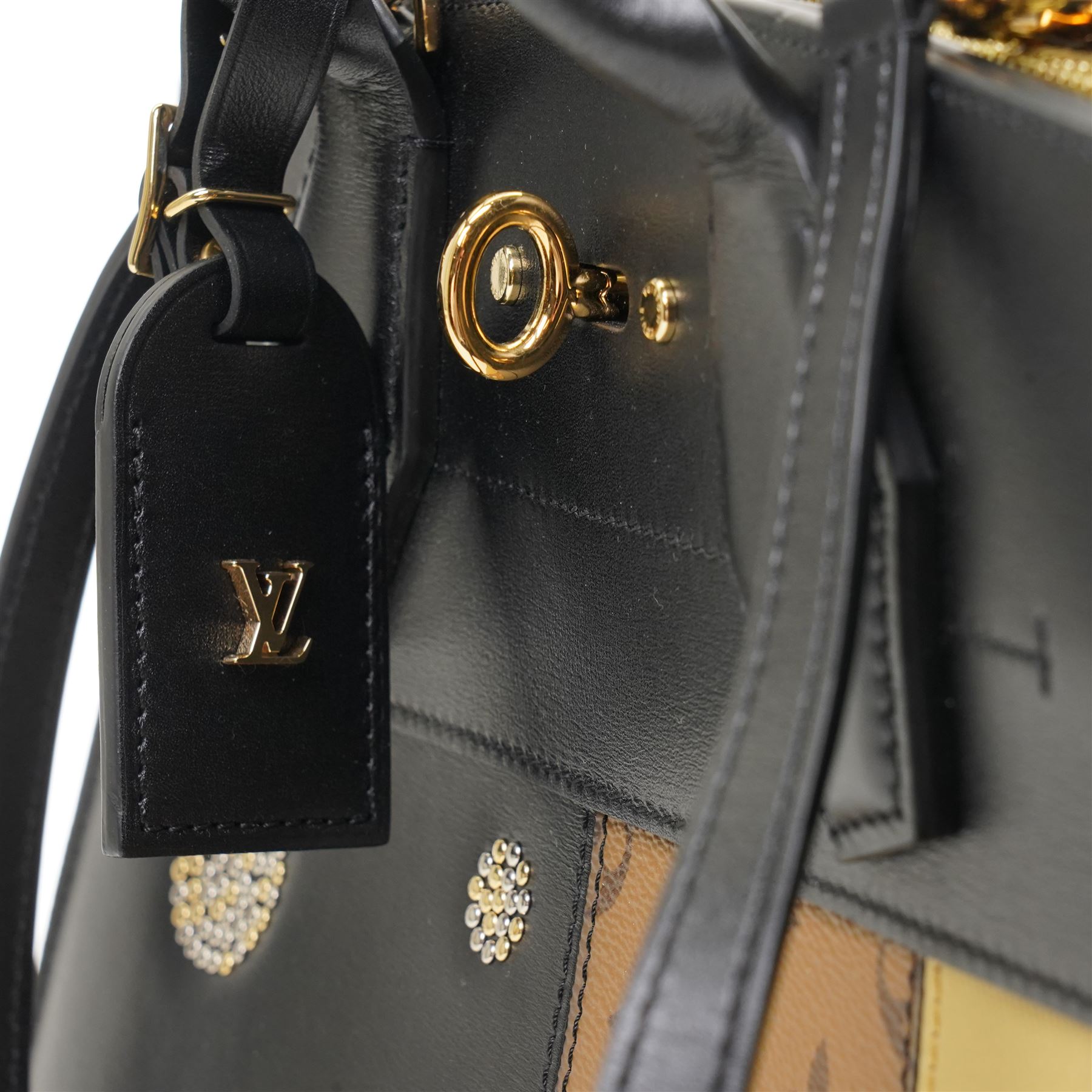 Louis Vuitton - ‘City Steamer MM’ 'Night Lights' Limited Edition Tote Bag, the model introduced for the Cruise 2016 collection under Nicolas Ghesquière, this example from the Spring/Summer 2017 collection, in black leather with Monogram canvas and contrasting pale gilt leather panels, applied with studded embellishments, with twin top handles and detachable shoulder strap, unused with padlock and luggage tag, original box and dust bag