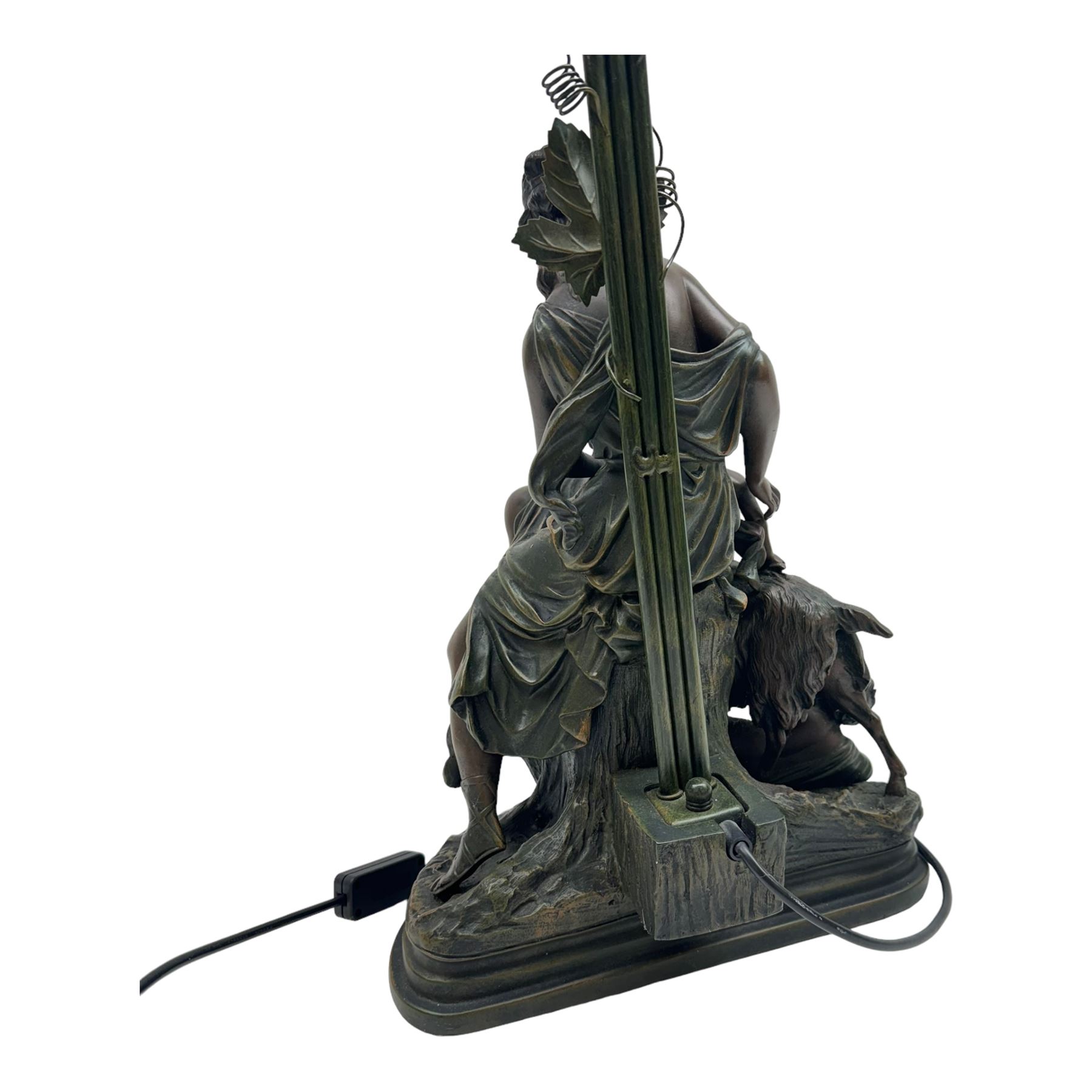 Large table lamp, the base modelled as a woman with putti and goat, with three glass shades, H90cm   