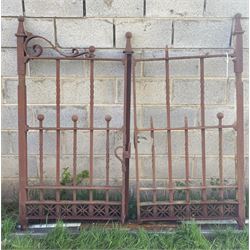 Heavy pair of wrought iron garden gates.