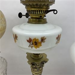 Brass Corinthian column oil lamp, upon stepped marble base, together three other brass table lamps, tallest H68cm