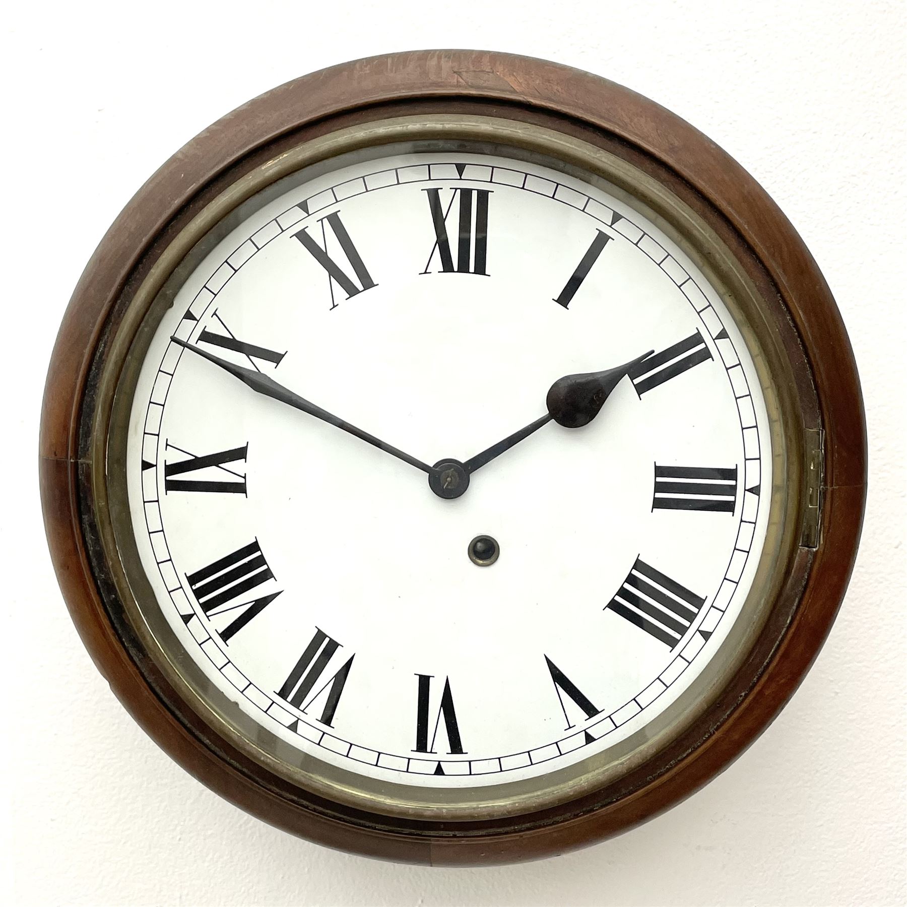 Early 20th century circular walnut cased wall clock, white enamel Roman dial, single train driven movement