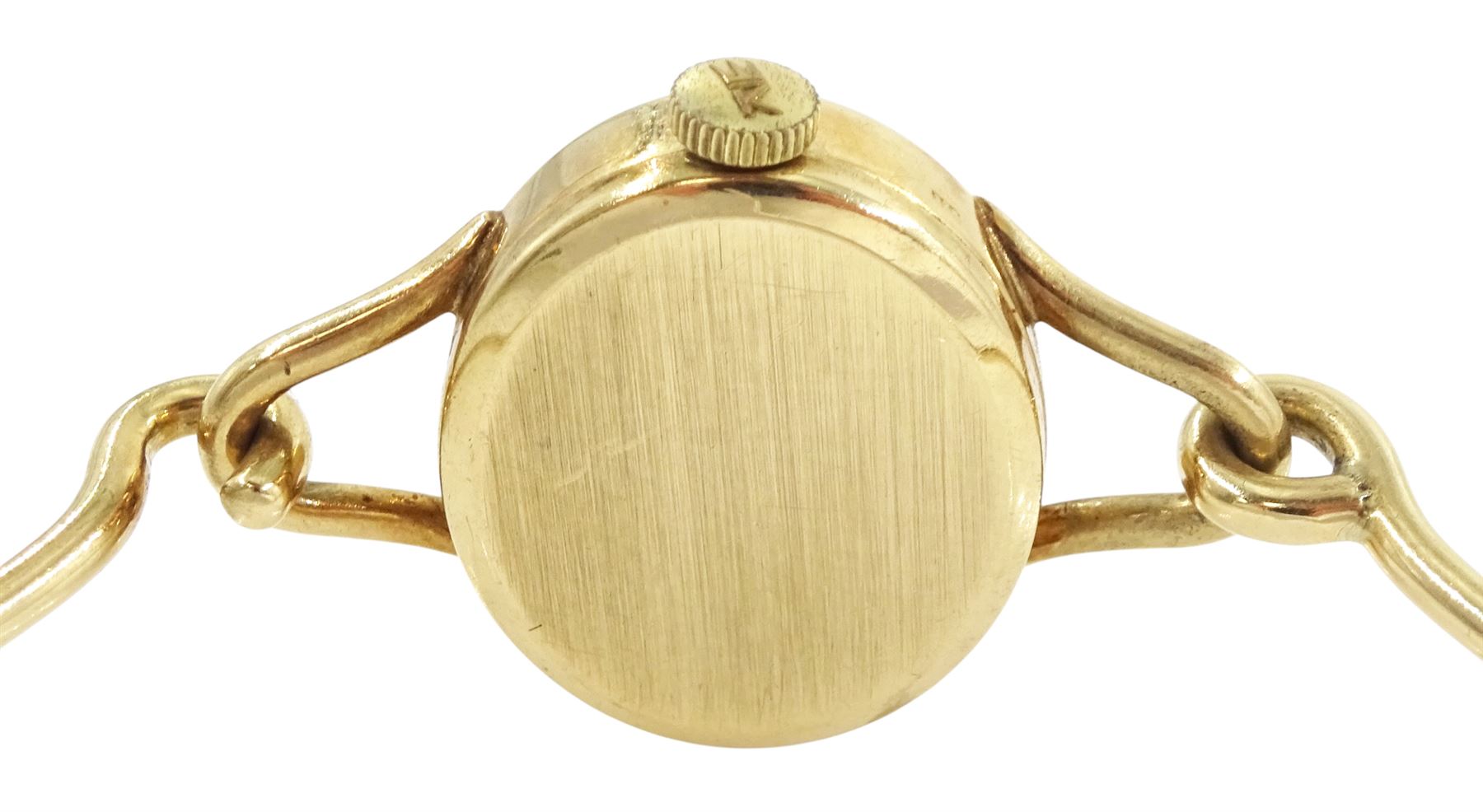 Roy King ladies 9ct gold manual wind wristwatch, black oval dial, on 9ct gold bangle, London 1978
