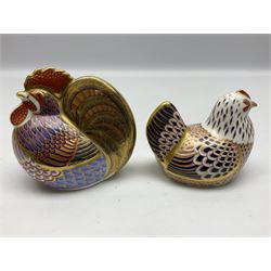 Two Royal Crown Derby paperweights modelled as a cockerel and hen, both with gold stoppers, tallest H10cm