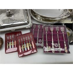 Silver plated Calibri lighter, in the form of a twin handled vase with mask handles, together with a pair of silver plated candle sticks, horn handled carving set with hallmarked silver ferrules and other silver plated items