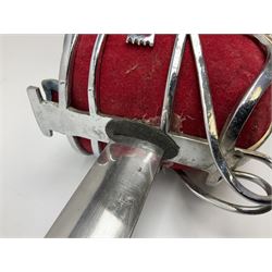 Reproduction Scottish basket hilted broadsword with 85cm double edged steel blade and red lined basket hilt with wire bound grip, in white metal mounted leather scabbard 107cm overall