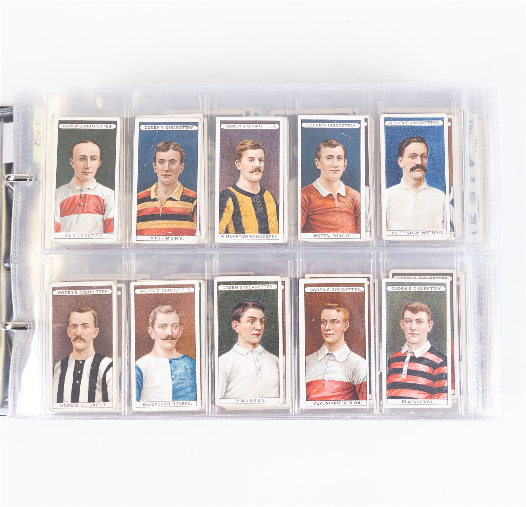 Collection of Edwardian and later Football related trading and cigarette cards, including forty-nine of fifty 1906 Ogden's Football Club Colours, 1922 PALS Footall series, ninety of one hundred 1925 Gallaher Famous Footballers, complete set of forty-four 1926 Ogden's Captains of Association Football Clubs and Colours, complete set of fifty 1927 Players Football Caricatures by MAC,  complete set of fifty 1927 Players Football Caricatures by RIP,  complete set of fifty 1930 Players Association Cup Winners, complete set of 50 1933 Ogdens AFC Nicknames etc, housed in brown cigarette card album