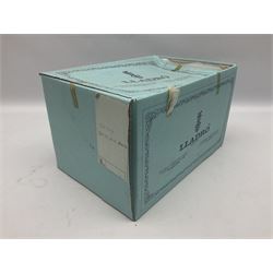 Lladro figure, In No Hurry, modelled as a girl on a tricycle, sculpted by Francisco Polope, with original box, no 5679, year issued 1990, year retired 1994, H15cm