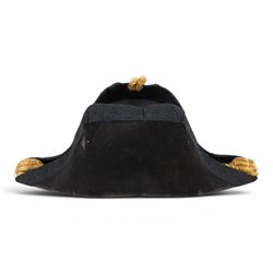 Early 20th century Royal Navy officers full dress bicorn hat, belt and epaulettes, the bicorn in black with gilt wire side and RN button, bullion work to each end marked to the interior with Gieves makers mark, all housed in fitted case