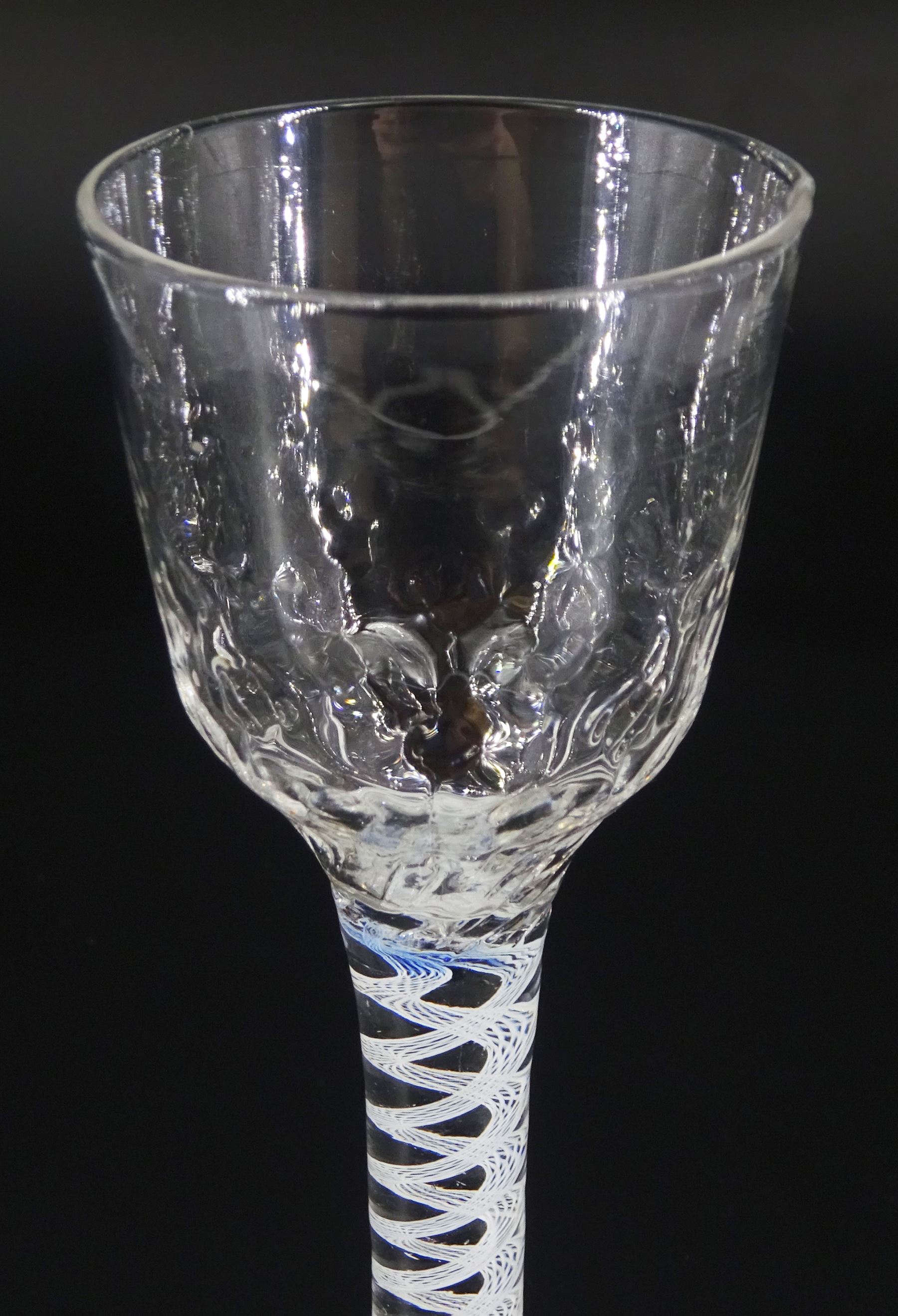 18th century drinking glass, the ogee part honeycomb moulded bowl upon a single series opaque twist stem and conical foot, H14.5cm