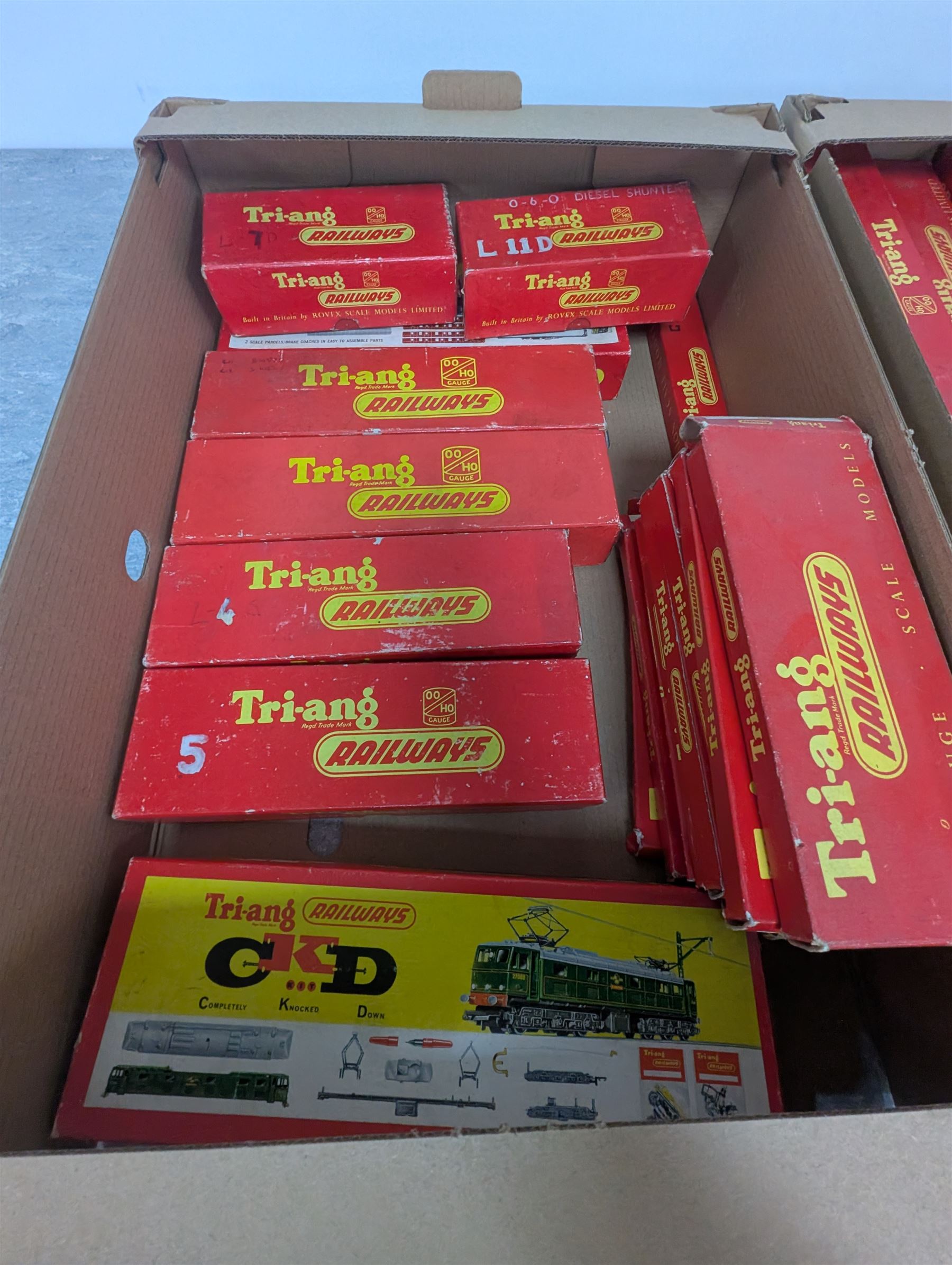 Collection of 00 gauge Hornby Dublo and Triang rolling stock, including one steam locomotive, two diesel shunters, breakdown crane, wagons, track and other accessories, mostly boxed, in three boxes