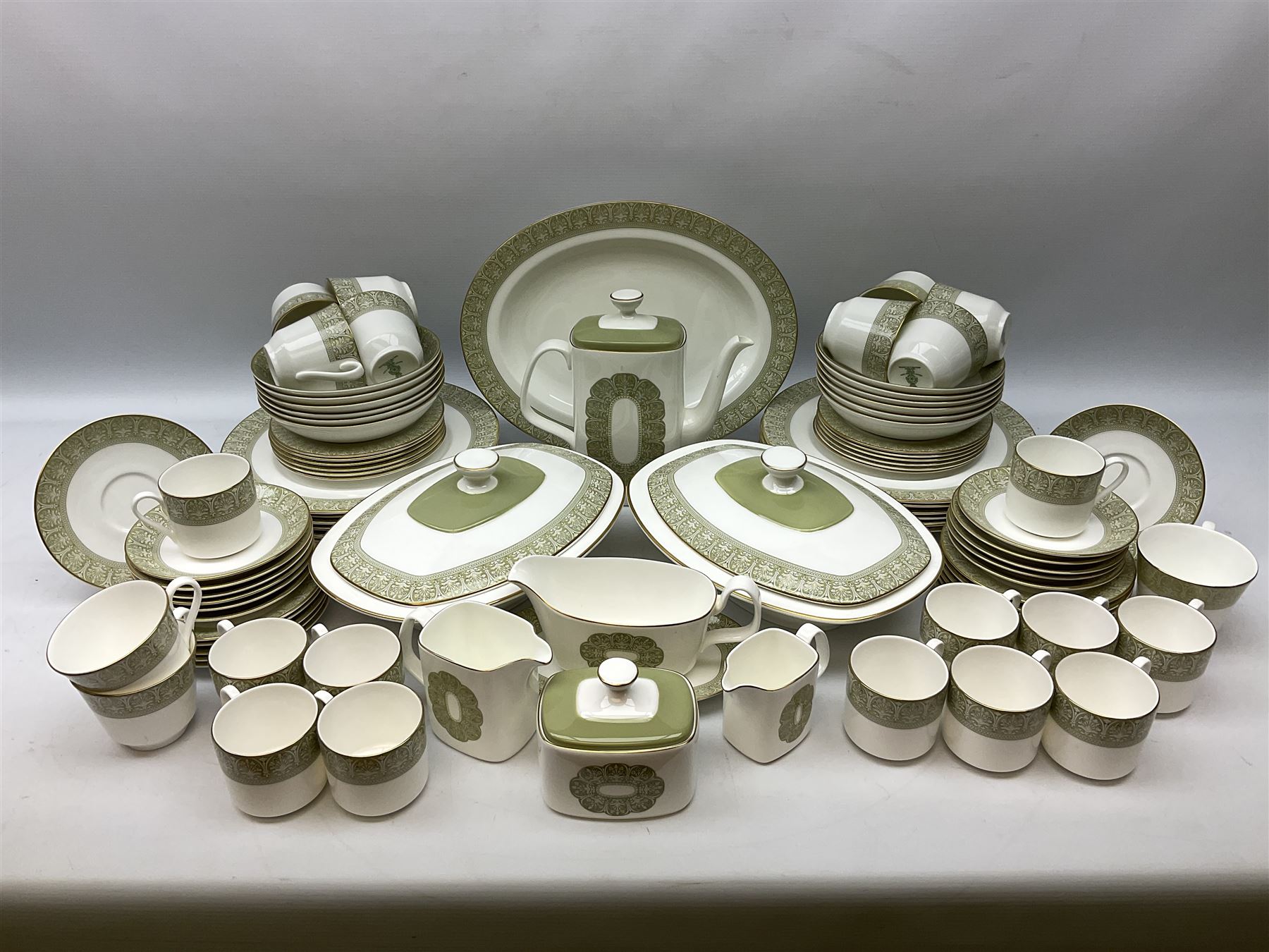 Royal Doulton Sonnet pattern part tea and dinner service, including  twelve dinner plates, twelve bowls, twelve side dishes, two covered tureens, one meat platter, coffee pot, twelve coffee cans and saucers etc (approx 90)