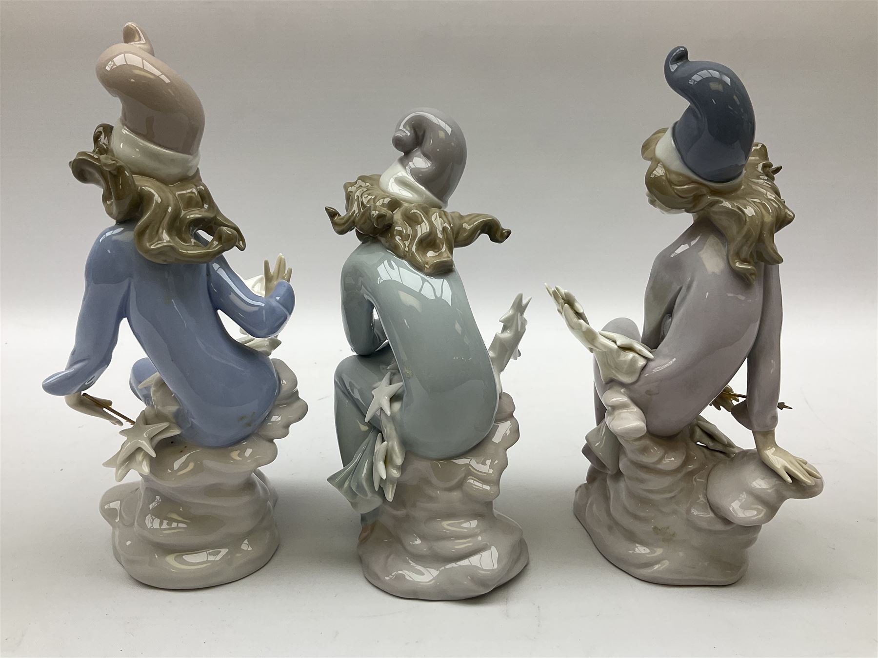 Lladro Star Bright Girl set, comprising Wishing on a Star no 1475, Starlight Starbright no 1476 and Stargazing  no 1477, all in original boxes, largest example H19cm