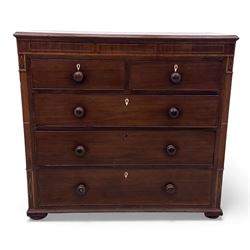 Early 19th century mahogany chest of drawers, the rectangular top with boxwood line inlay above two short and three long graduating drawers, each with turned wooden knobs and bone escutcheons, flanked by fluted uprights with diamond inlaid panels, on shaped bracket feet