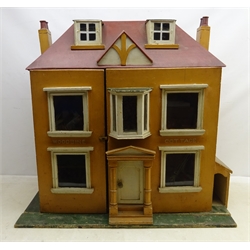 Early 20th century painted wooden dolls house Woodbine Cottage, two storey with a collection of vintage wooden and plastic furniture including Kleeware, H80cm x W84cm   