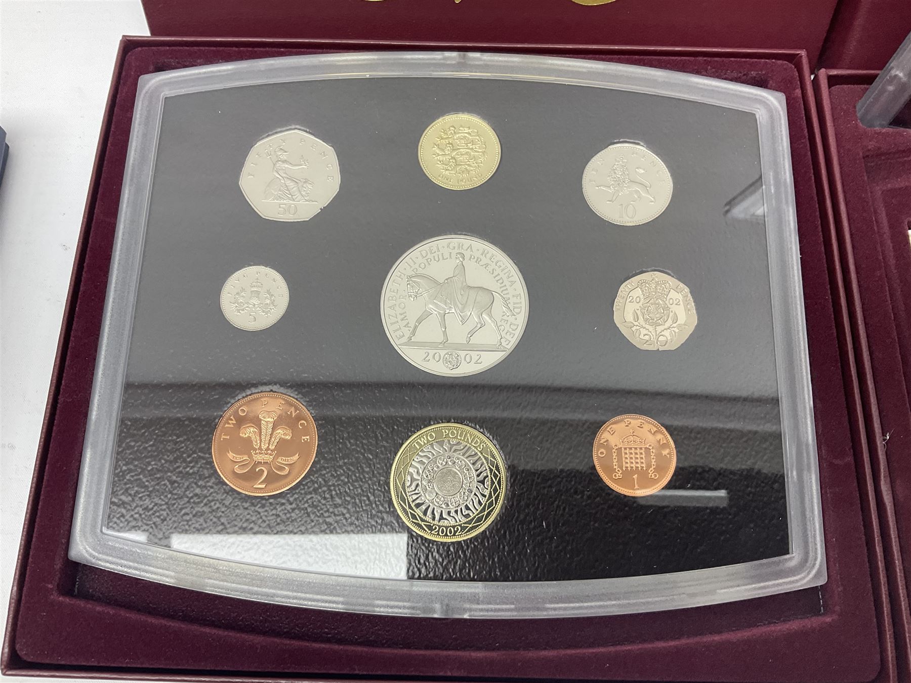 Four The Royal Mint United Kingdom proof coin collections, dated 2000, 2001, 2002 and 2003, all in display boxes with certificates