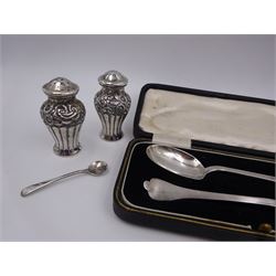Group of silver, comprising small trophy cup, cased spoon and fork set, pair of pepper shakers, etc, all hallmarked 