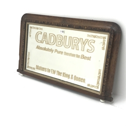  Victorian inlaid walnut overmantle mirror with later Cadbury's advertising, W83cm, H49cm  