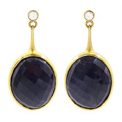 Pair of 18ct gold sapphire and diamond pendant earrings, each stud set with a single briol...