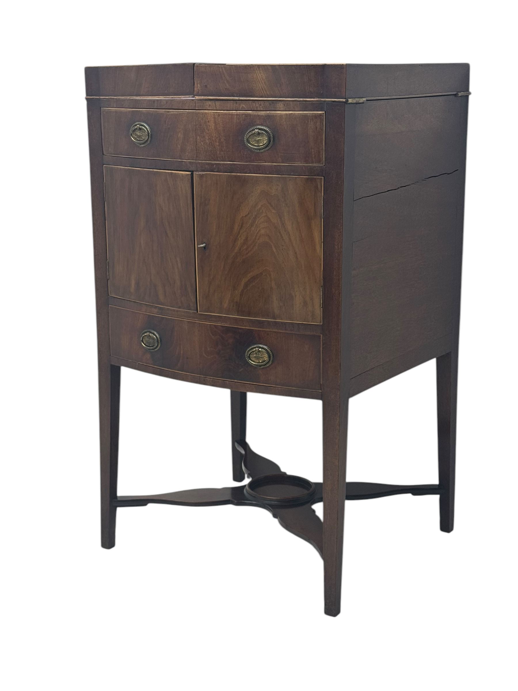 Part canteen of silver plated cutlery, including ivorine handled table and dessert knives, table forks, dessert forks, dessert spoons, teaspoons and soup spoons, all contained within a canteen cabinet converted from a George III mahogany enclosed wash stand