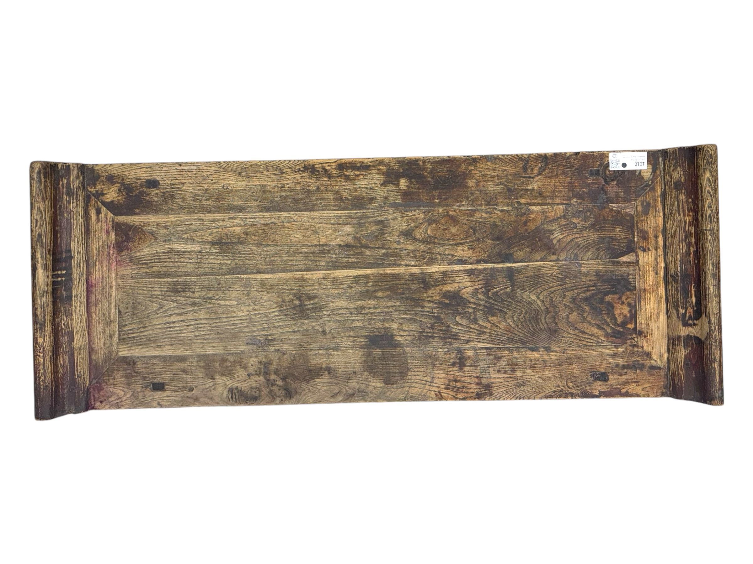 Mid-19th century elm low altar table, rectangular top with scrolled ends, fitted with three small drawers, pierced and scroll carved brackets, on square moulded supports 